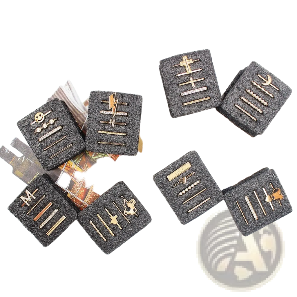 Set of gold-toned and silver-tone stud earrings with lightning bolts crosses moons hearts and smiley faces designs
