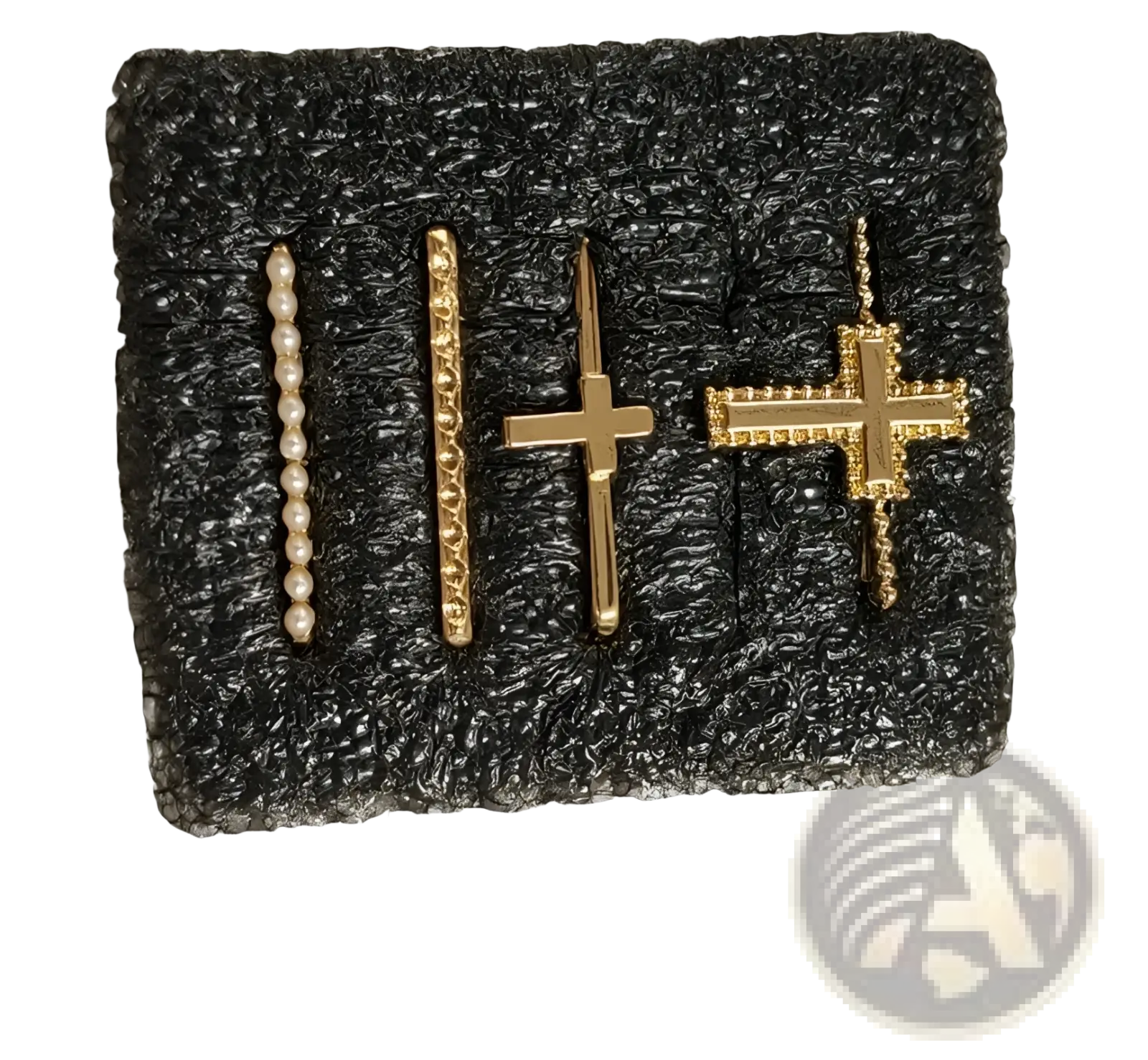Set of four gold-toned cross and beaded bar earrings on black foam backing from gold embellished silicone strap ring set