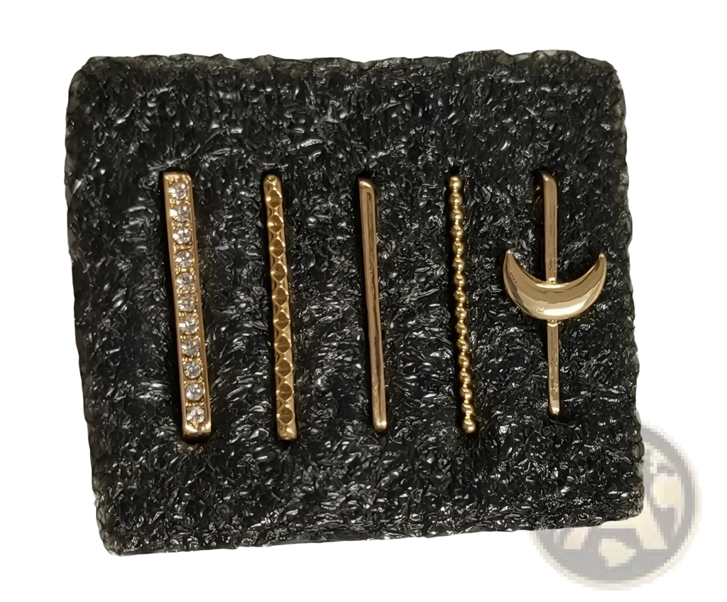 Set of five gold-toned bar-style earrings with pave stones textured patterns and crescent moon motif details