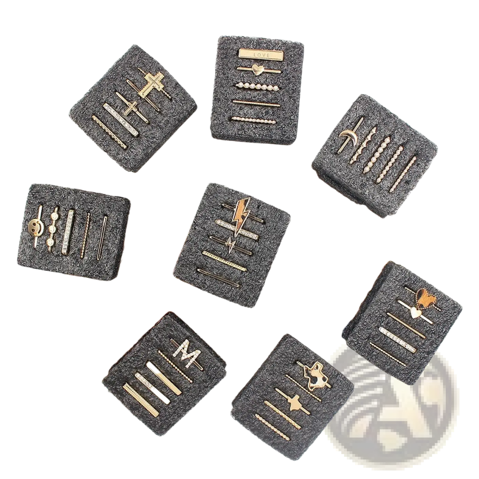 Gold-toned hairpins with intricate designs and sparkling embellishments in black textured boxes from gold embellished silicone strap decorative ring set