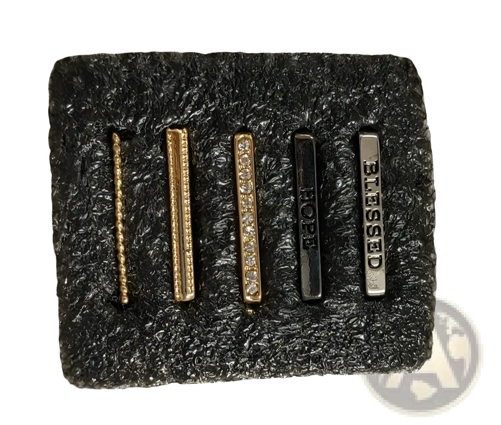 Set of five gold-toned and silver-toned bar earrings with clear stones for the gold embellished silicone strap decorative ring set