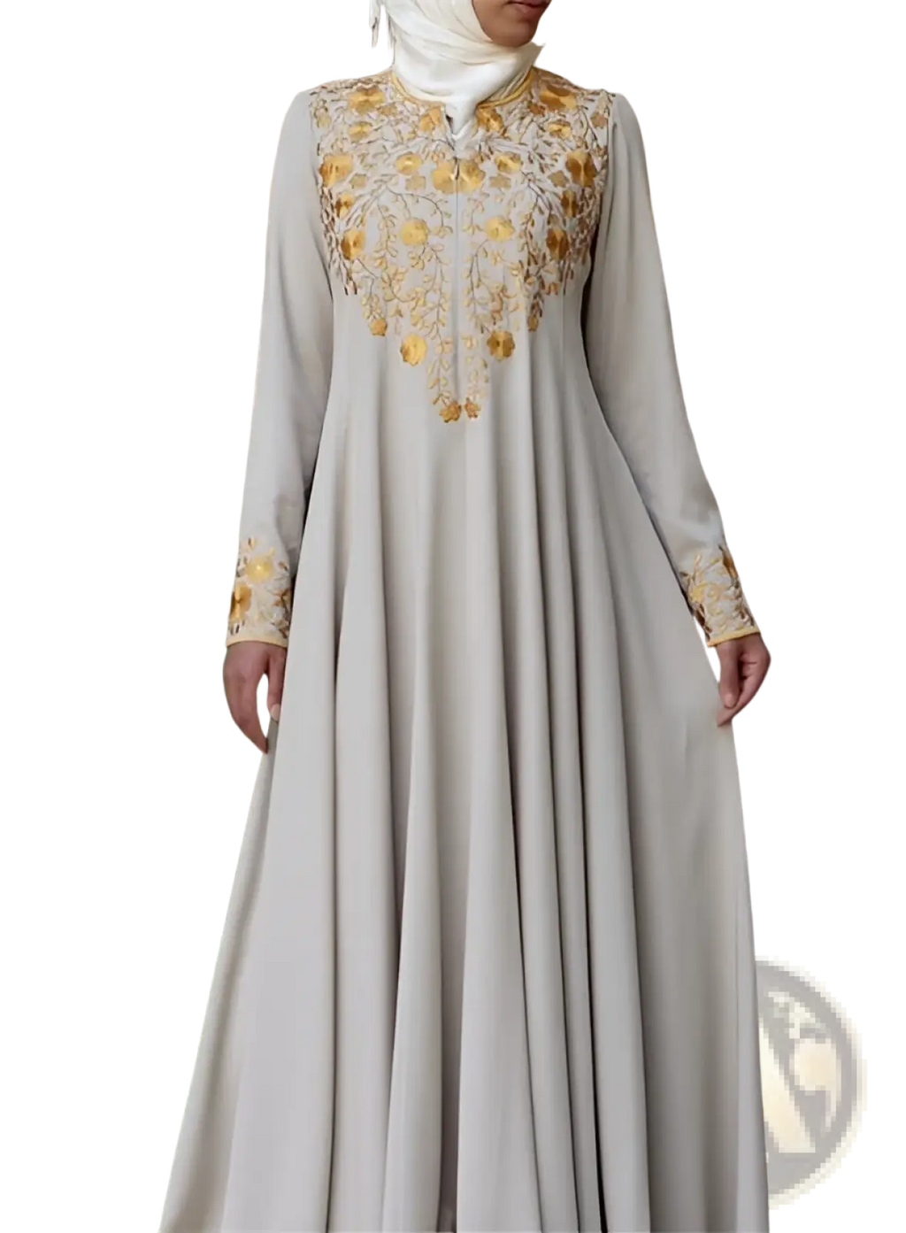 A flowing beige cotton abaya dress with intricate gold floral embroidery along the neckline and cuffs