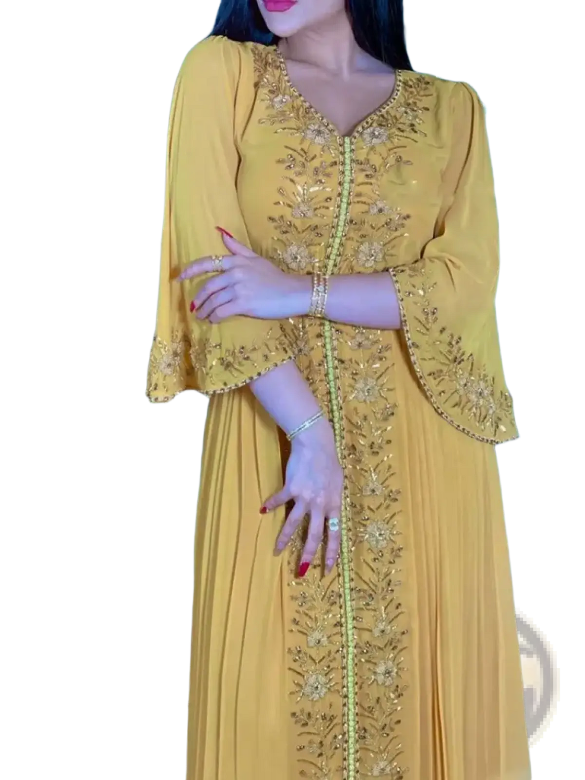 A flowing mustard abaya kaftan dress with gold embroidered floral patterns on the front and sleeves