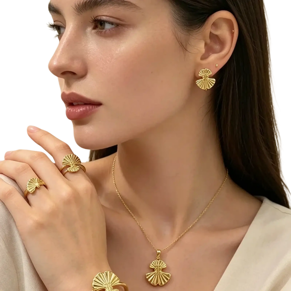Gold fan shape jewelry set 18k plated featuring intricate detailing in earrings rings necklace pendant and bracelet