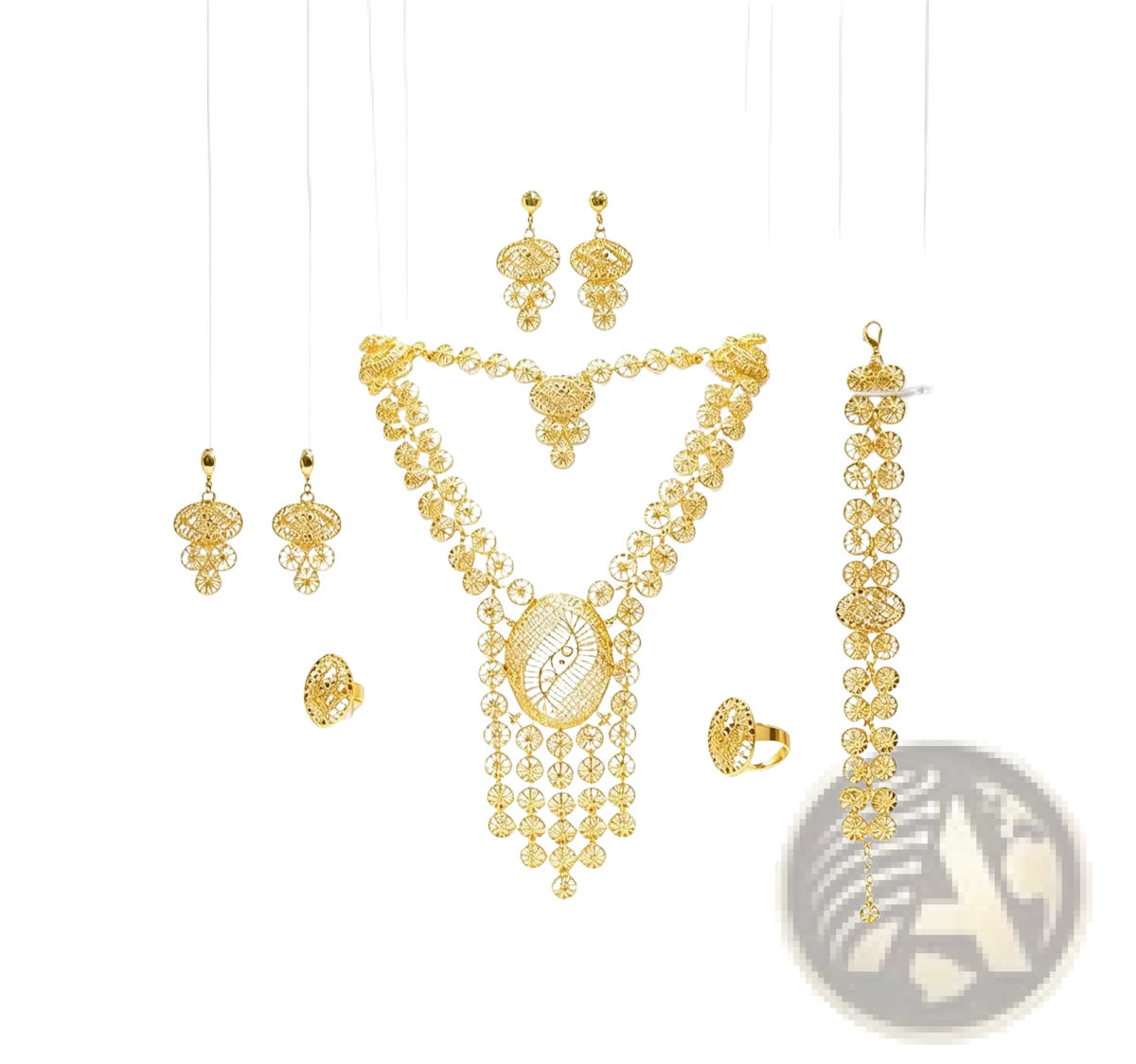 Gold filigree bridal jewelry set featuring a golden necklace with intricate circular and floral patterns and central oval pendant