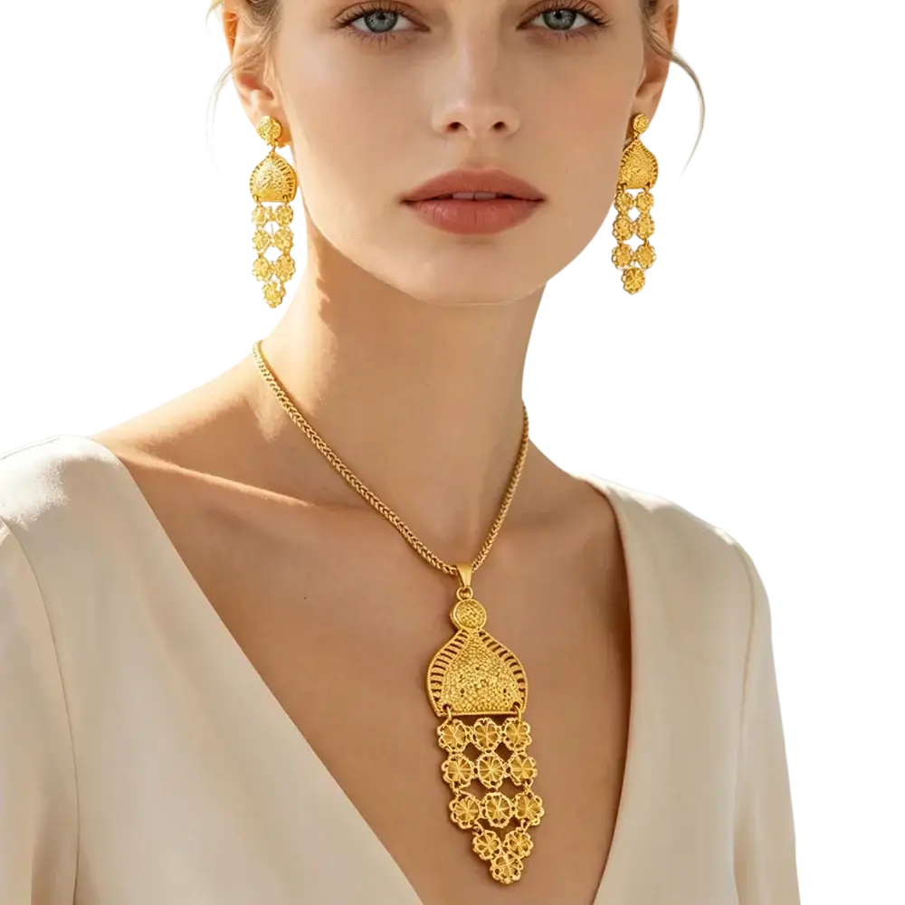Elegant gold filigree pendant necklace with intricate tassel design and floral motifs for Dubai wedding bridal jewelry set