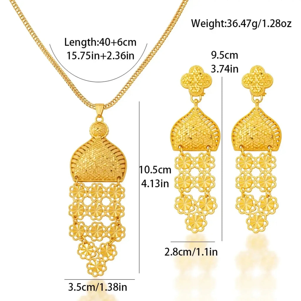 Gold filigree tassel jewelry set with intricate floral patterns featuring a pendant necklace and matching earrings for Dubai wedding bridal
