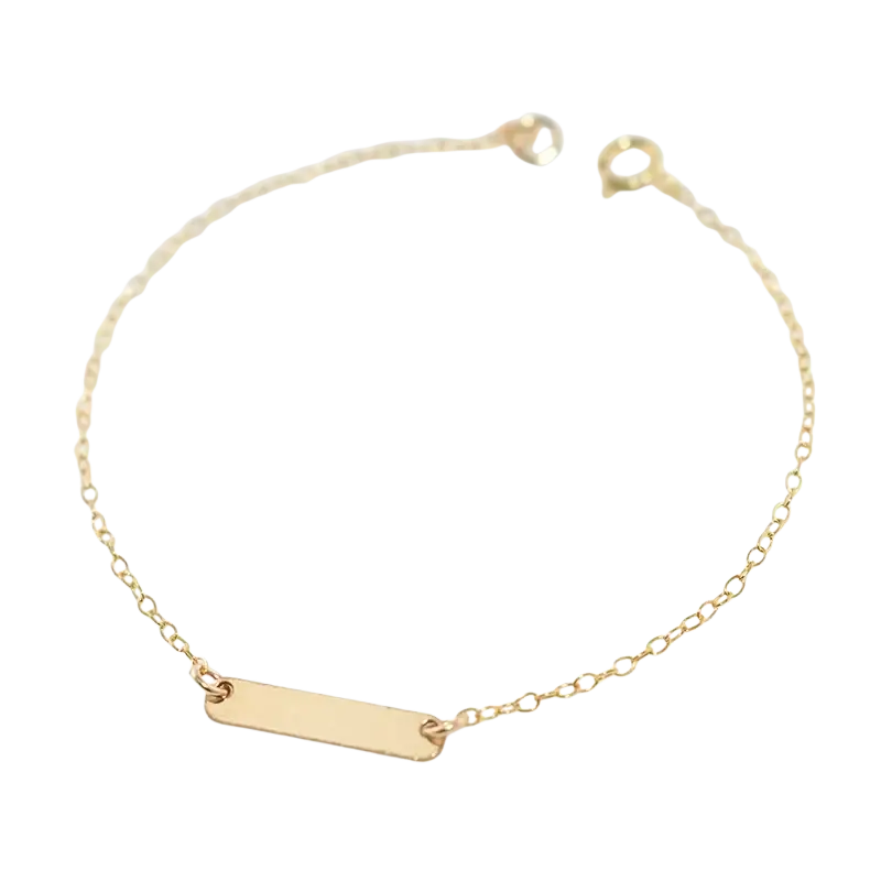 Gold filled gold toned minimalist bar charm bracelet with delicate chain and smooth rectangular nameplate tarnish resistant mechanically bonded