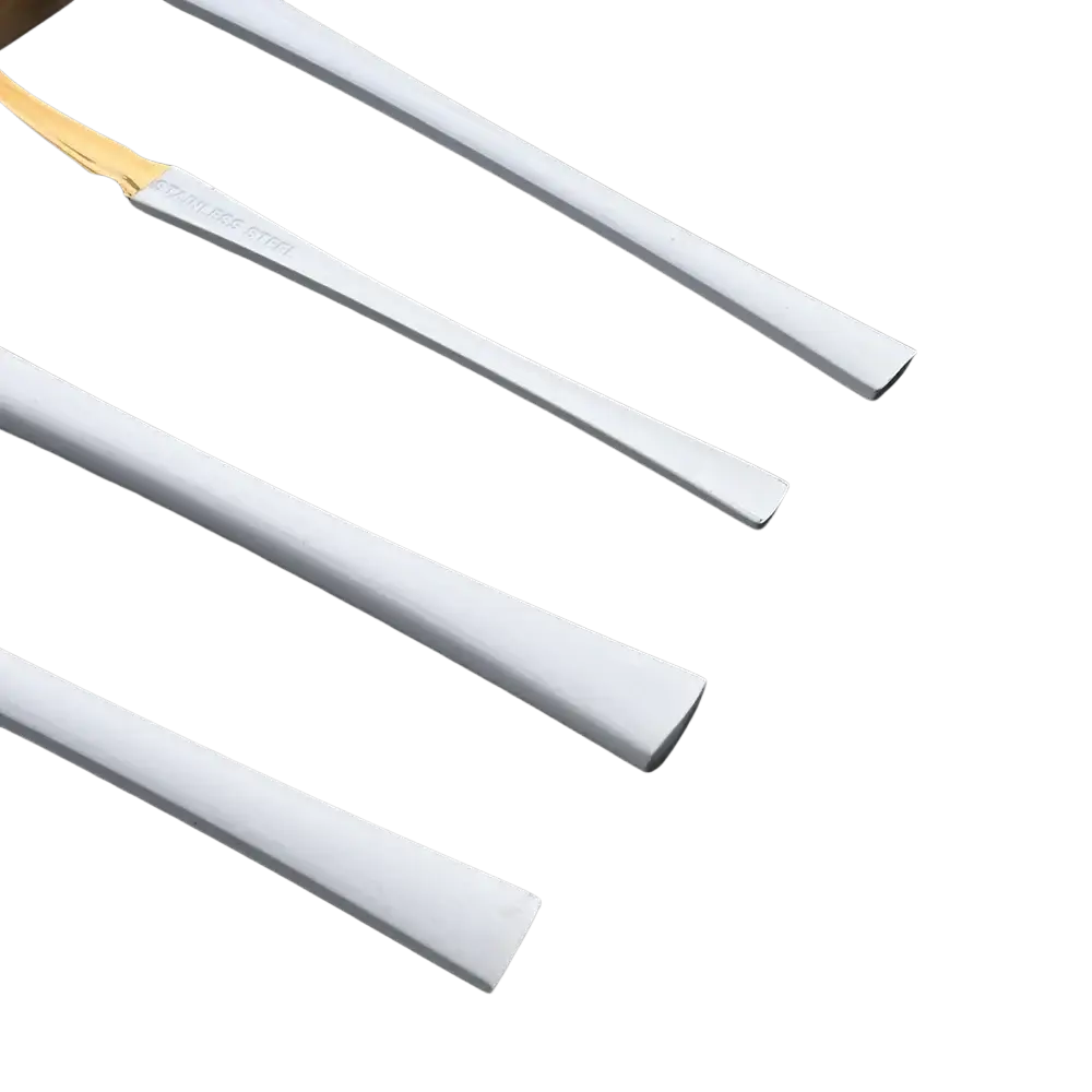 White stainless steel dessert spoons with gold-colored handle ends from a gold flatware set stainless steel cutlery 16pcs