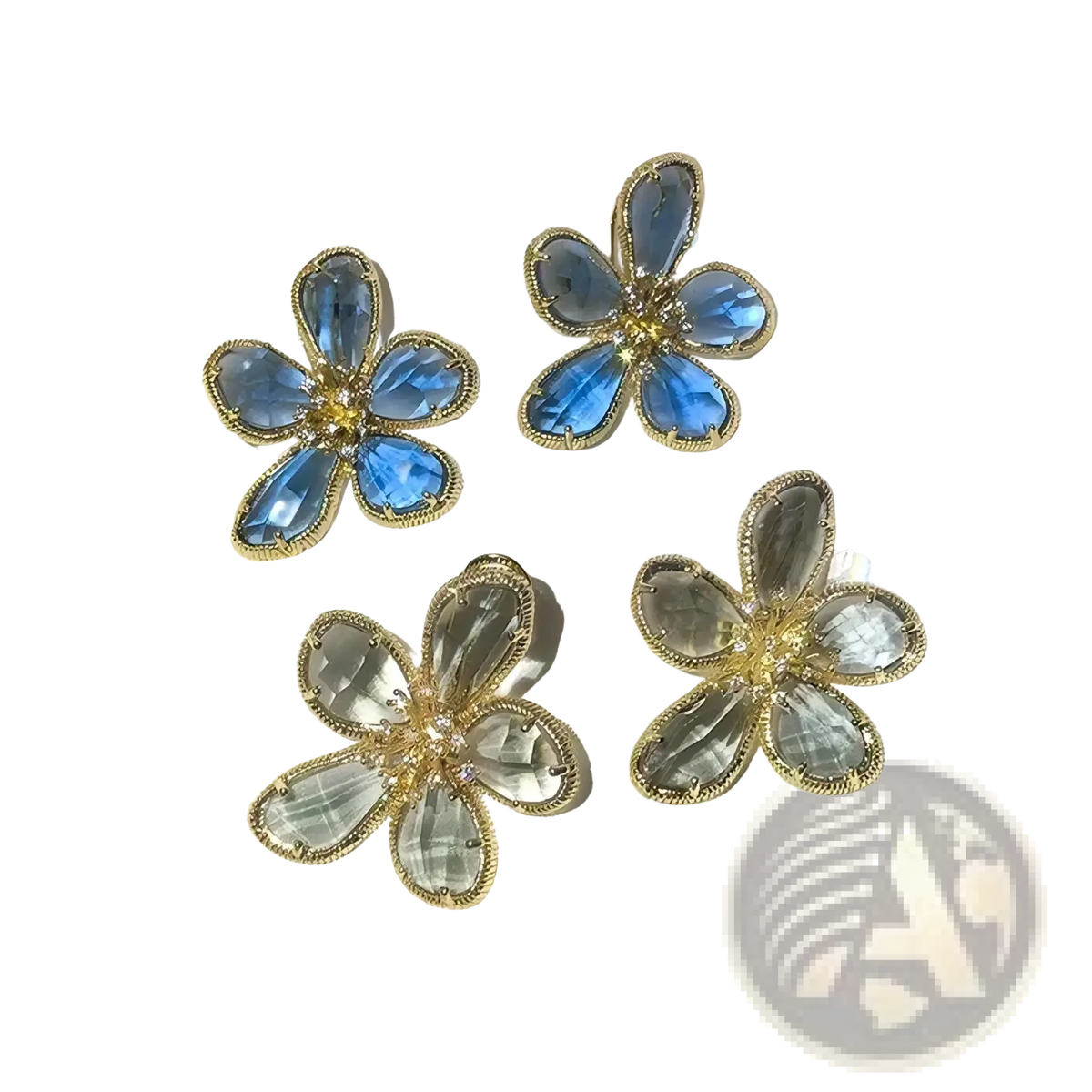 Blue and clear crystal flower-shaped stud earrings with gold-tone metal settings for elegant wear