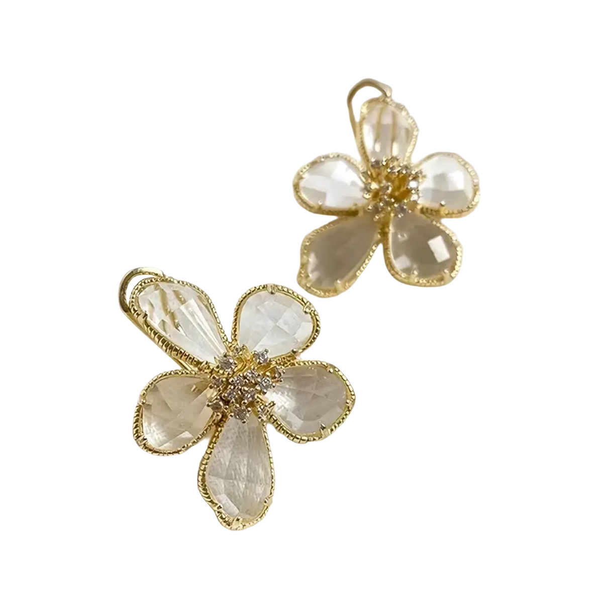 Gold flower crystal stud earrings with delicate gold tone, clear faceted crystal petals, and central diamond cluster