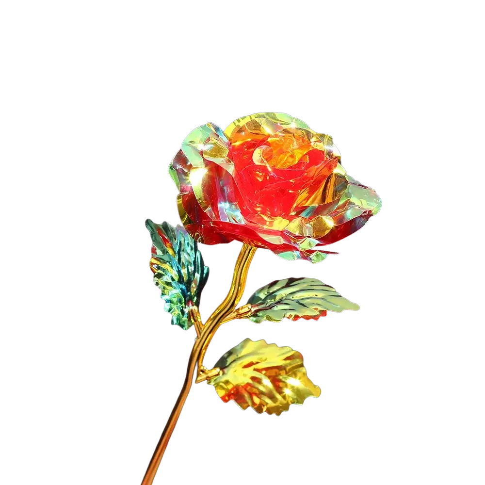 A gold foil artificial rose with crystal-encrusted petals and a radiant red center for eternal gift giving