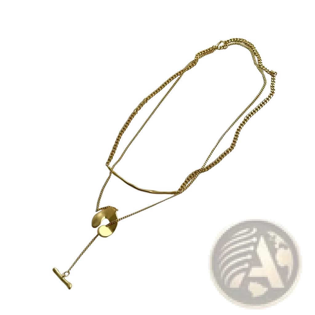 Gold geometric layered pendant necklace for women featuring gold-toned curb and fine chains with abstract pendants