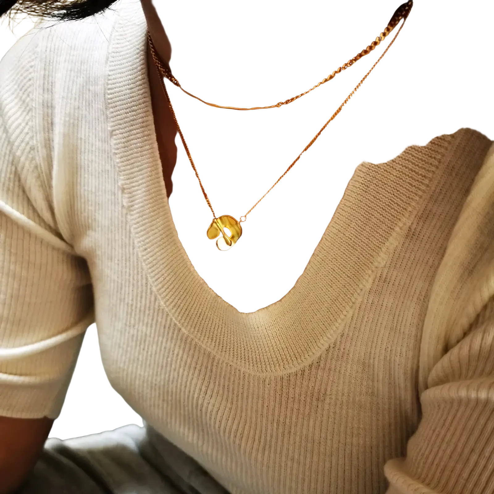 Gold geometric layered pendant necklace for women featuring a gold-toned delicate chain and a small shiny musical note pendant