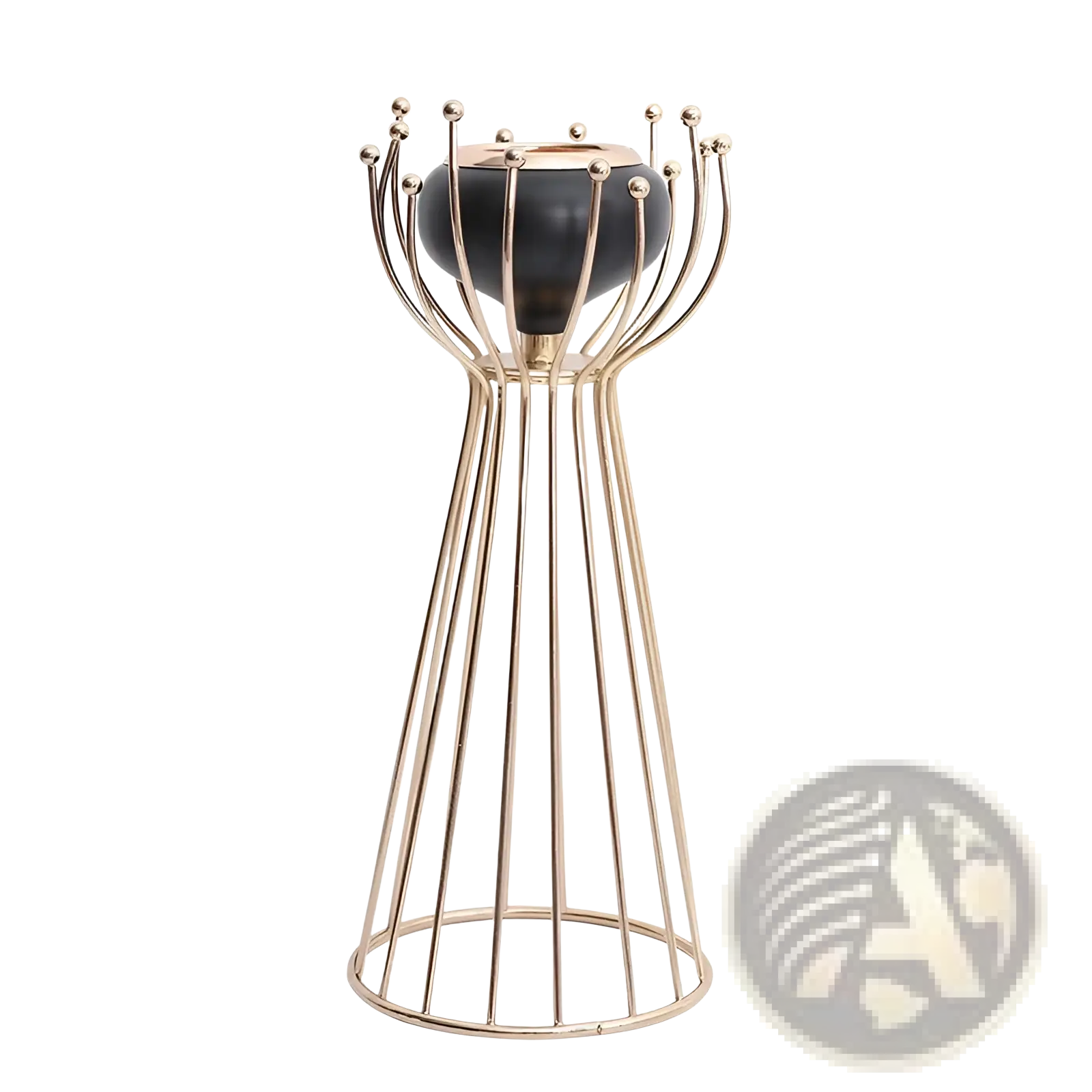 Gold geometric wire cage candle holder with gold-toned metal and sleek black ceramic base with decorative spheres