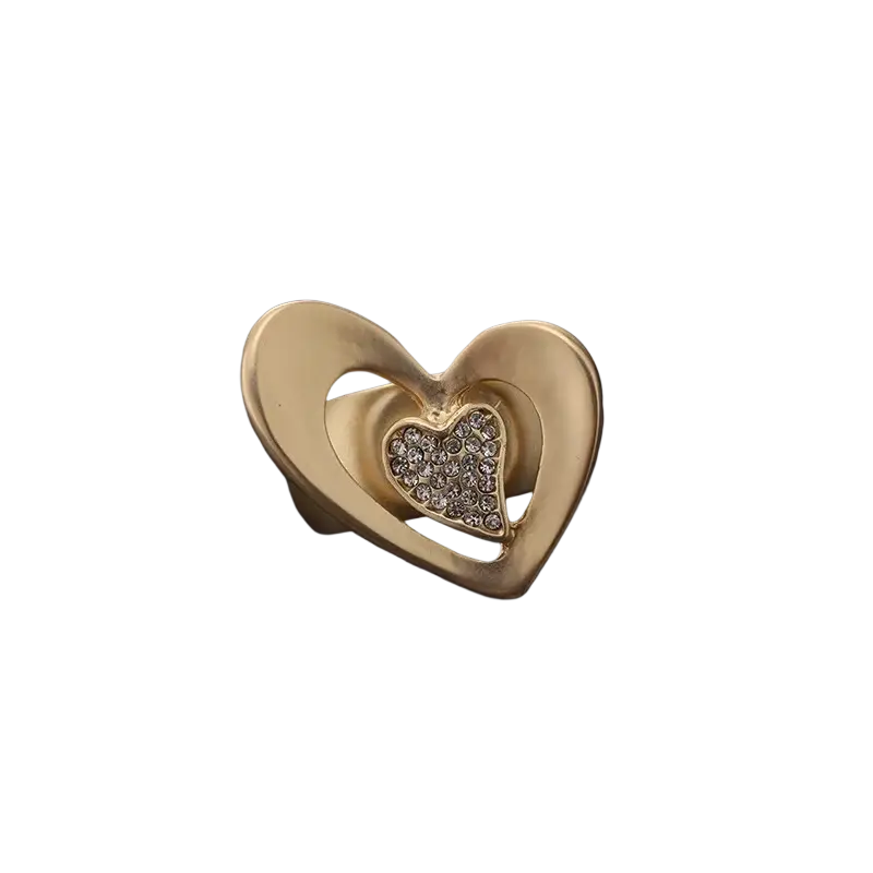 Gold-toned heart ring with a smaller pave-set crystal heart center rhinestone adjustable jewelry ring