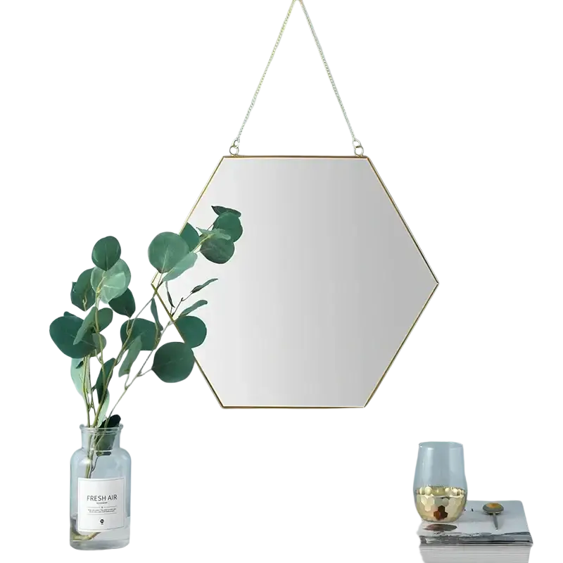 Gold hexagonal wall hanging mirror with thin gold metal frame and hanging chain for decorative use