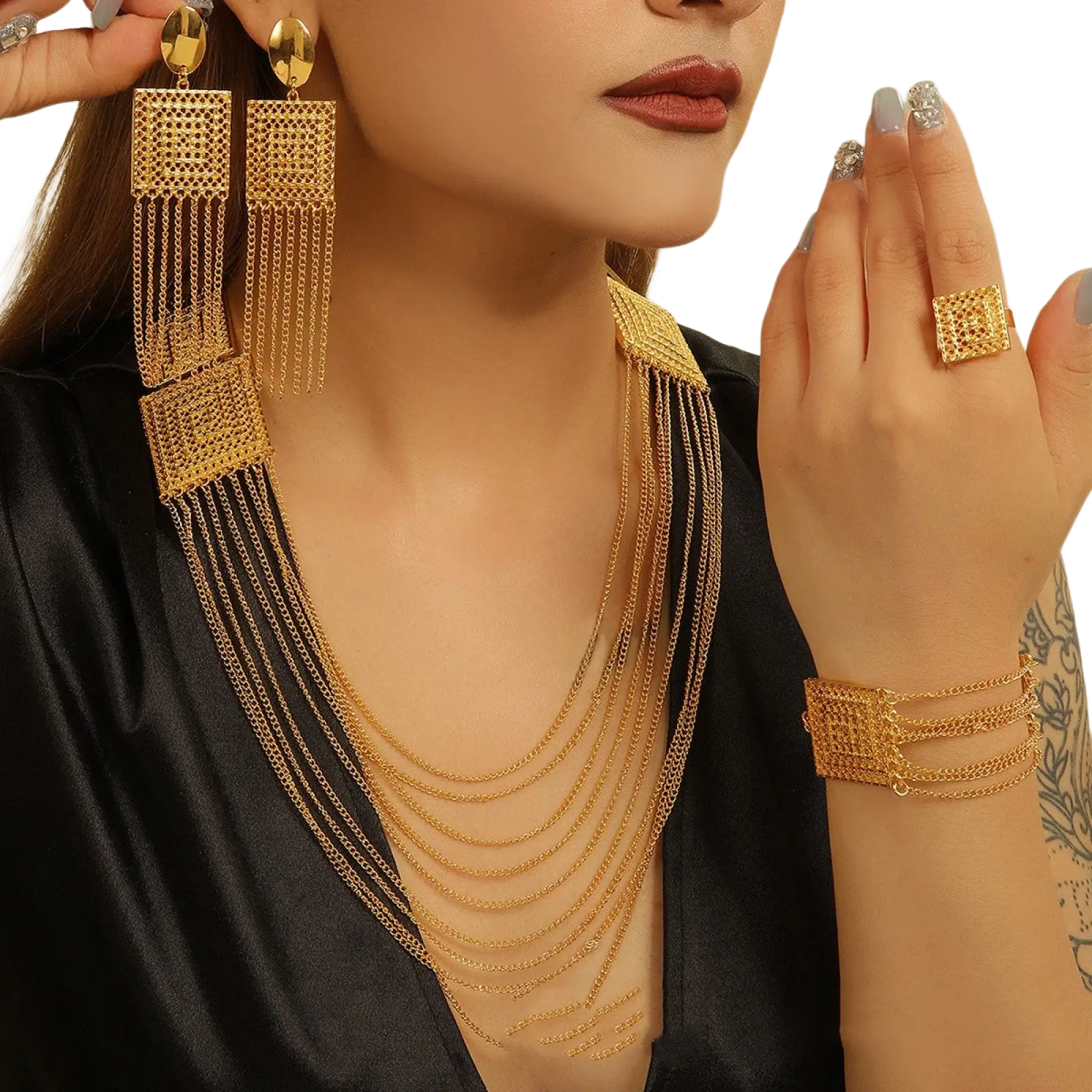Gold layered tassel necklace featuring gold-toned chain with geometric mesh accents and cascading fringe details