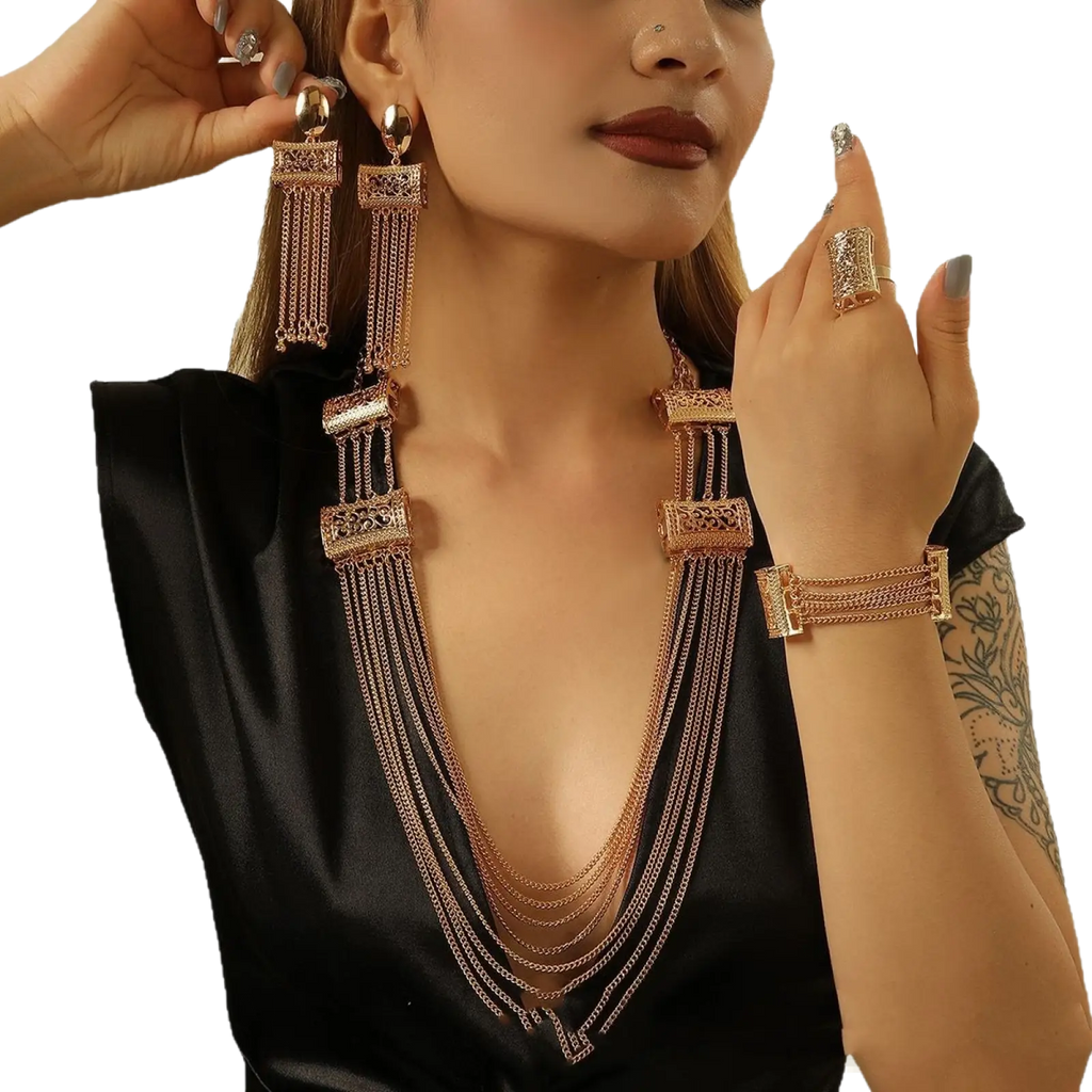 Gold layered tassel necklace with gold-toned rectangular embellishments and delicate dangling chain strands