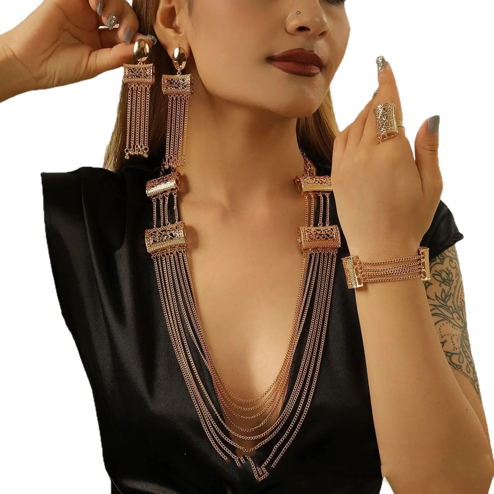 Gold layered tassel necklace with gold-toned rectangular embellishments and delicate dangling chain strands