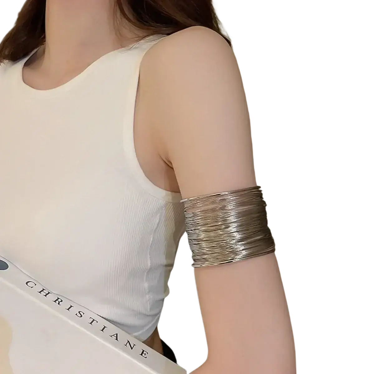 Shiny gold layered wire cuff bracelet with a stacked design worn on an arm, featuring a metallic wire cuff style