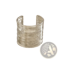 Silver wire cuff bracelet with layered textured design displayed as part of gold layered wire cuff collection