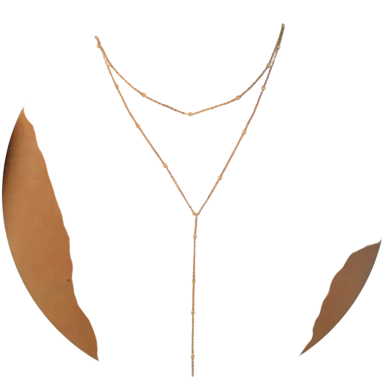 Gold layered y necklace for women featuring a delicate gold-toned design with small spherical beads on chains