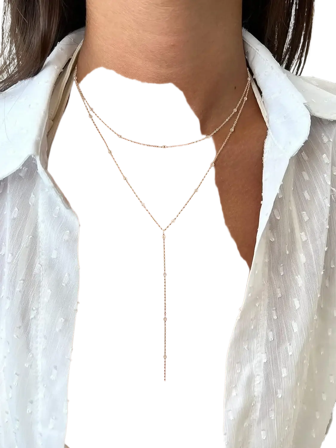 Gold layered y necklace for women with delicate gold-toned v-shaped pendant and small spherical beads along chain
