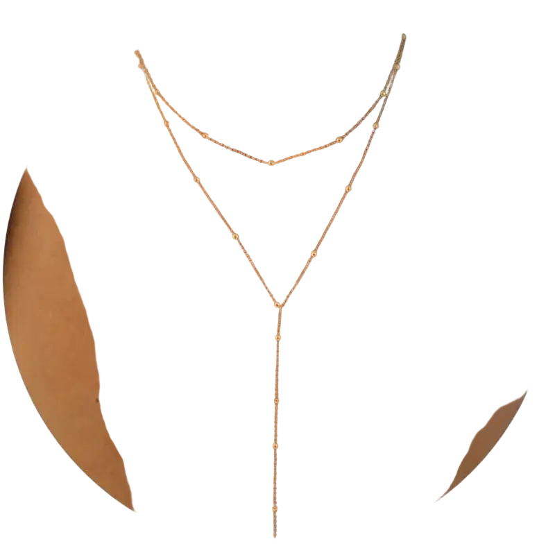 Gold layered y necklace for women with delicate gold-toned chains and small spherical beads in a y-shaped design
