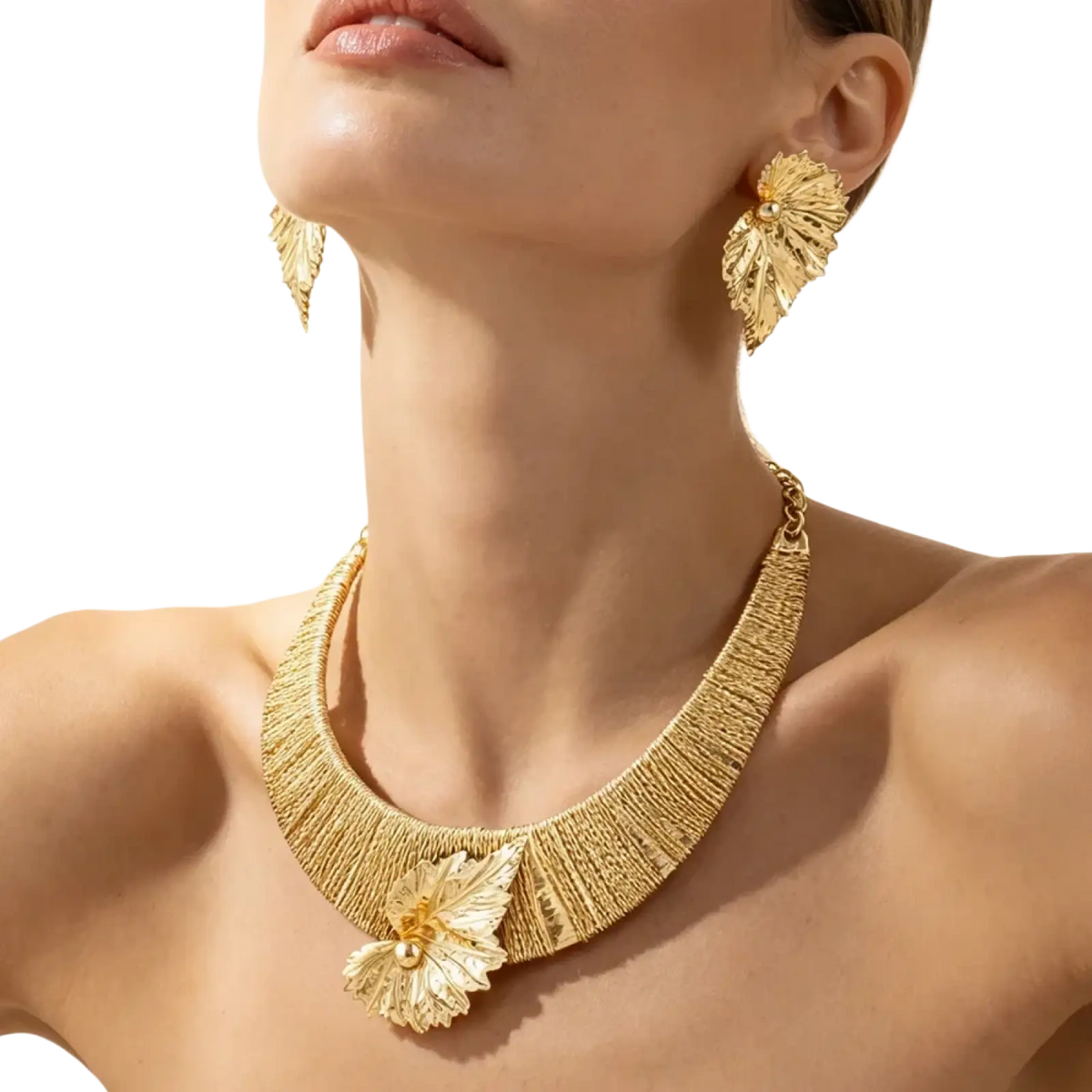Gold leaf pearl necklace featuring an intricate textured design with a central pearl accent in gold finish