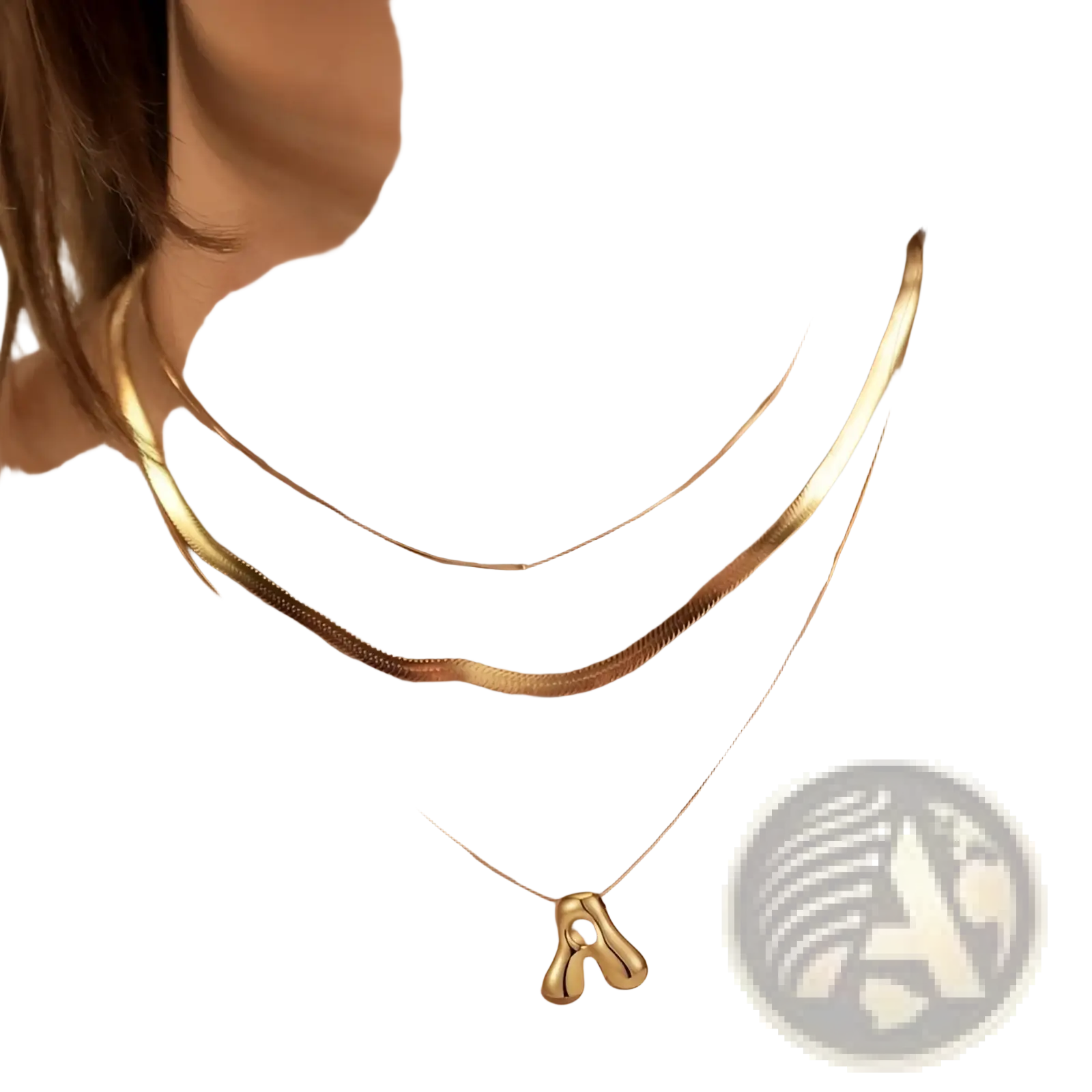 Gold toned layered snake chain necklace with smooth cable chain and minimalist letter a pendant in sleek design