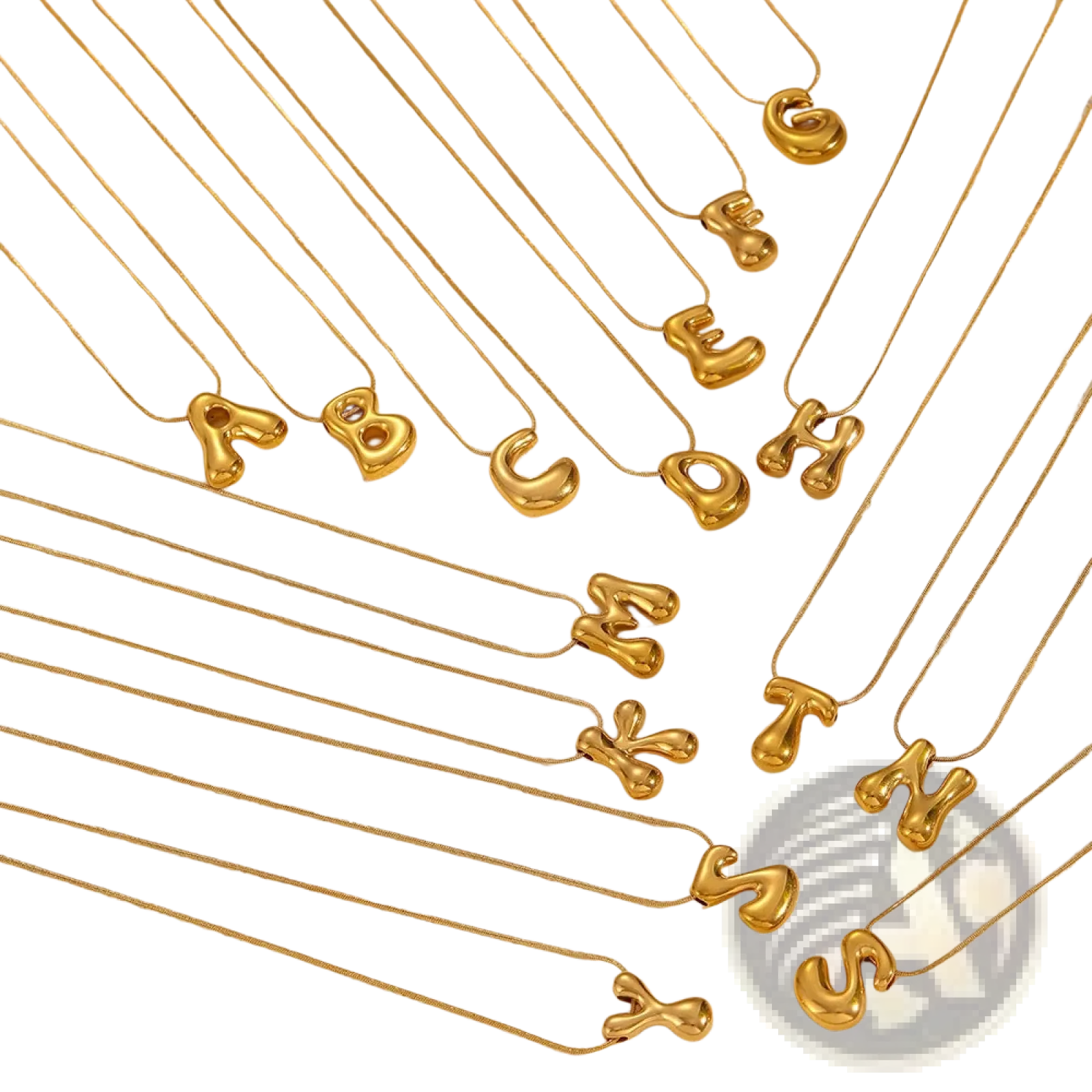 Gold-colored balloon-shaped letter necklaces on delicate layered snake chains made of fine metal