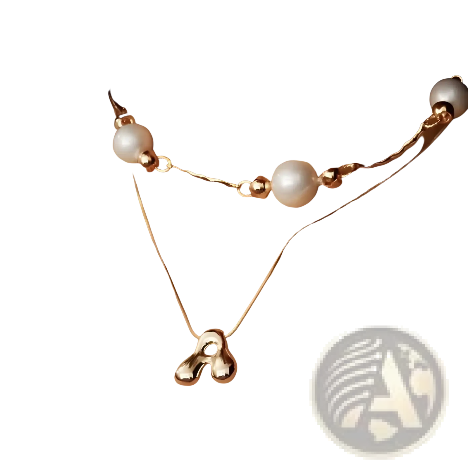 Gold letter a layered snake chain necklace with a delicate gold-toned twisted chain and three large white pearls