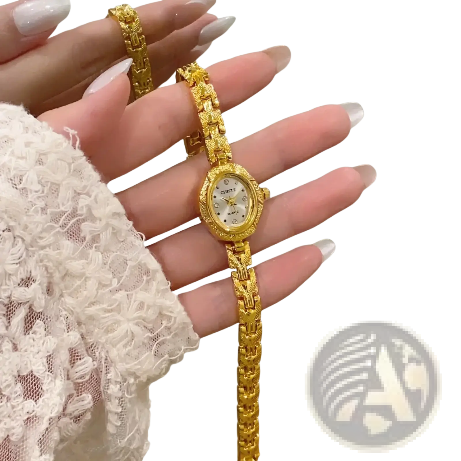 Gold luxury women’s bracelet watch with an ornate oval face and matching gold-toned chain-link band