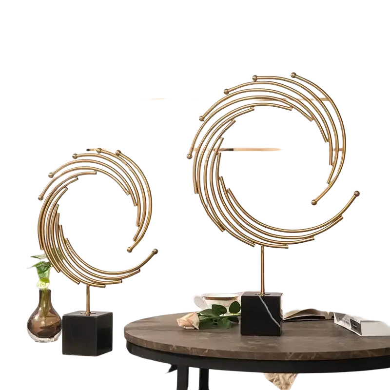 Gold metal abstract sculpture featuring a golden metallic spiral design for modern office desk decor