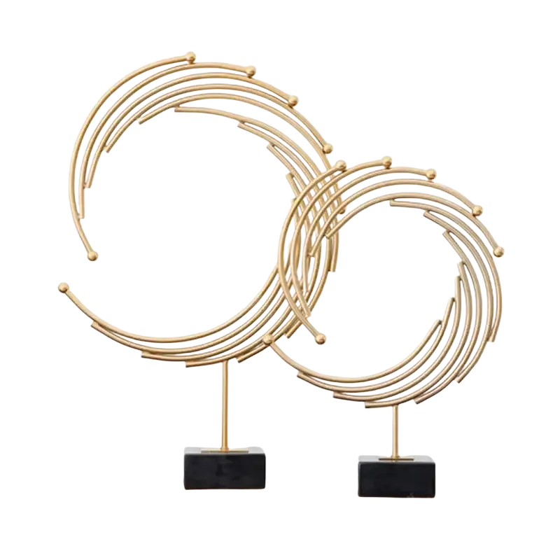 Gold metal abstract sculpture with concentric rings and spheres on black marble bases for office desk decor