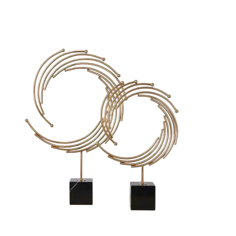 Gold metal abstract sculpture with interlocking circular rings and black marble bases for office desk decor