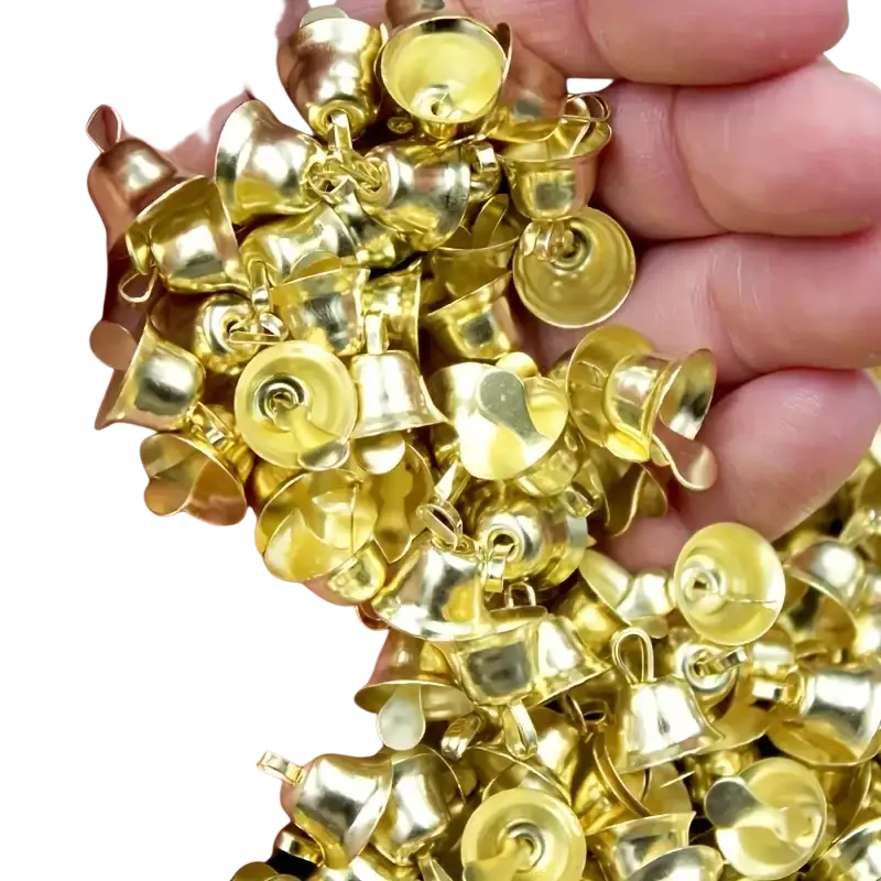A collection of shiny gold metal sleigh bells with classic shape and looped tops 20 pieces