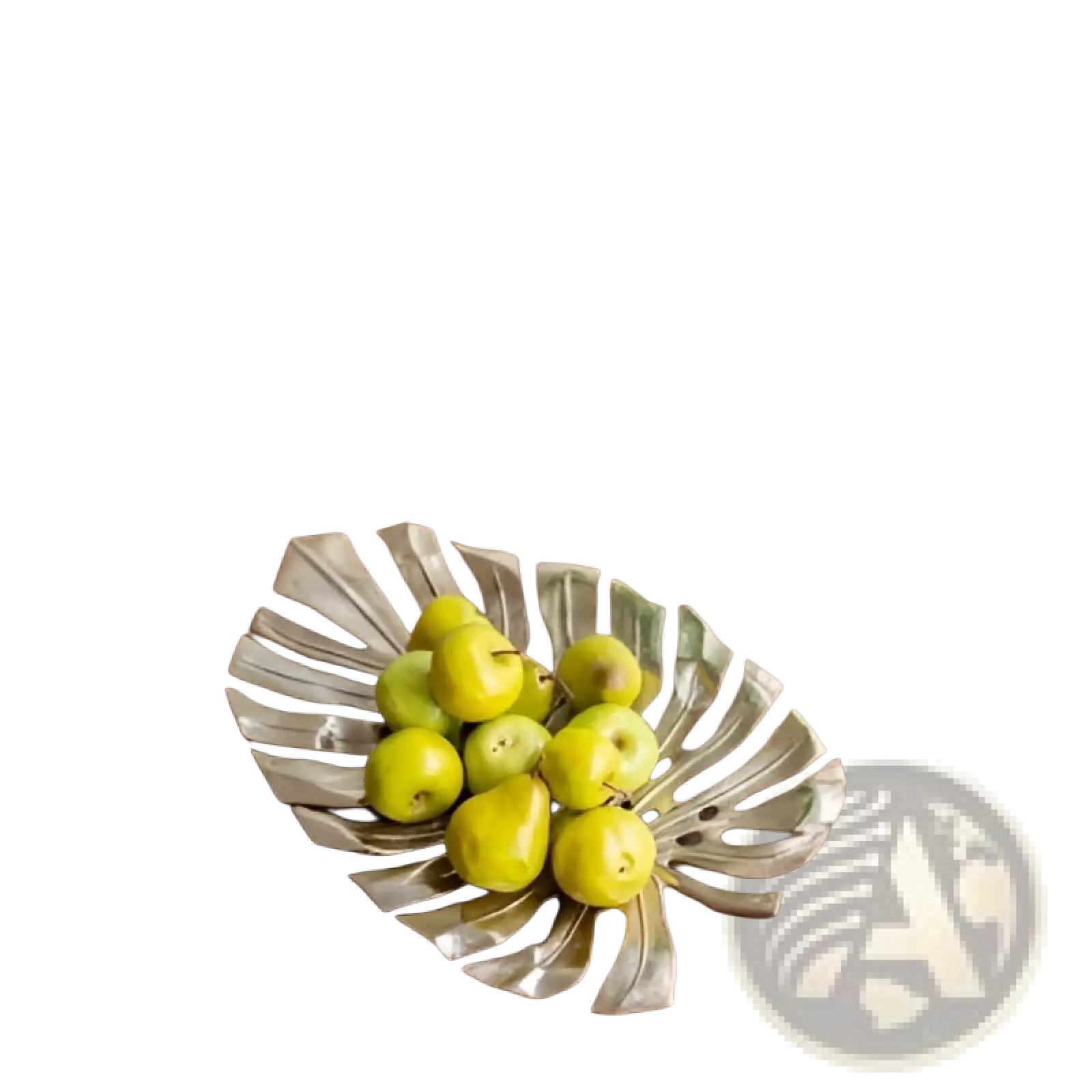 Bronze monstera leaf-shaped fruit bowl made of metal for serving and wall decor in gold monstera leaf collection