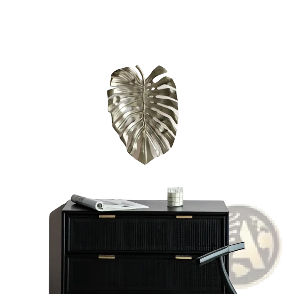 Silver metallic monstera leaf wall art featured in gold monstera leaf wall decor and serving tray product design