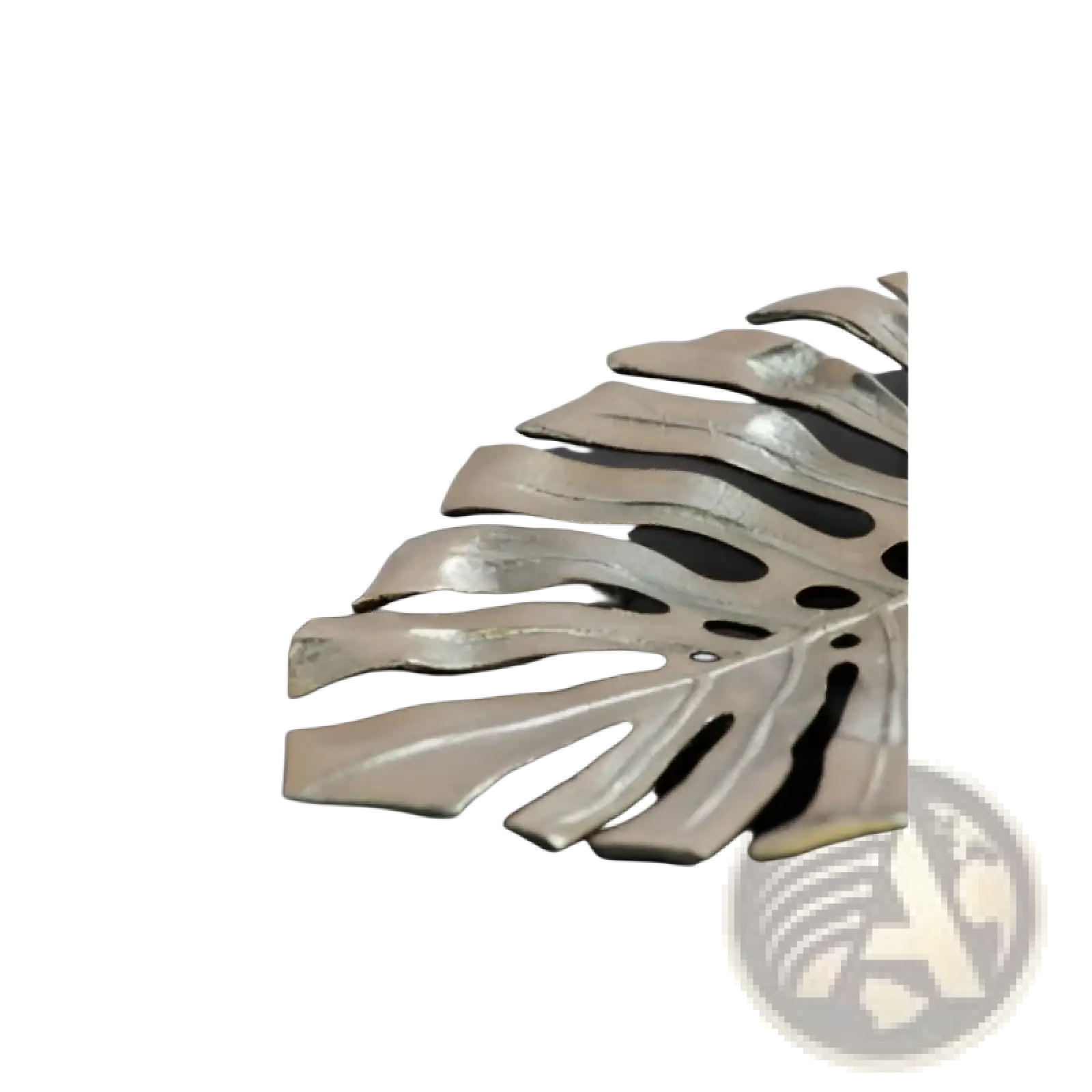 Silver-toned metal monstera leaf serving tray with sleek modern design featured in gold monstera leaf wall decor