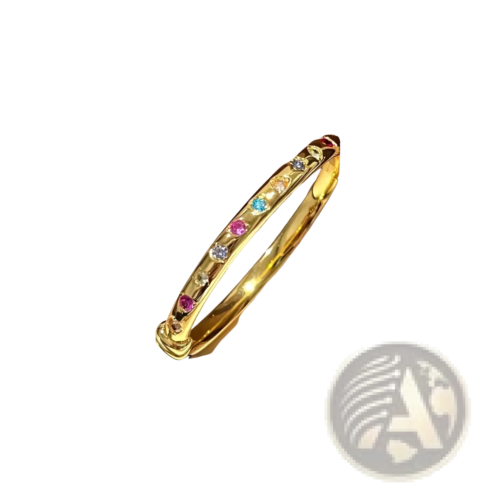 A gold multicolored gemstone bangle bracelet featuring a sleek design with vibrant colorful gemstones