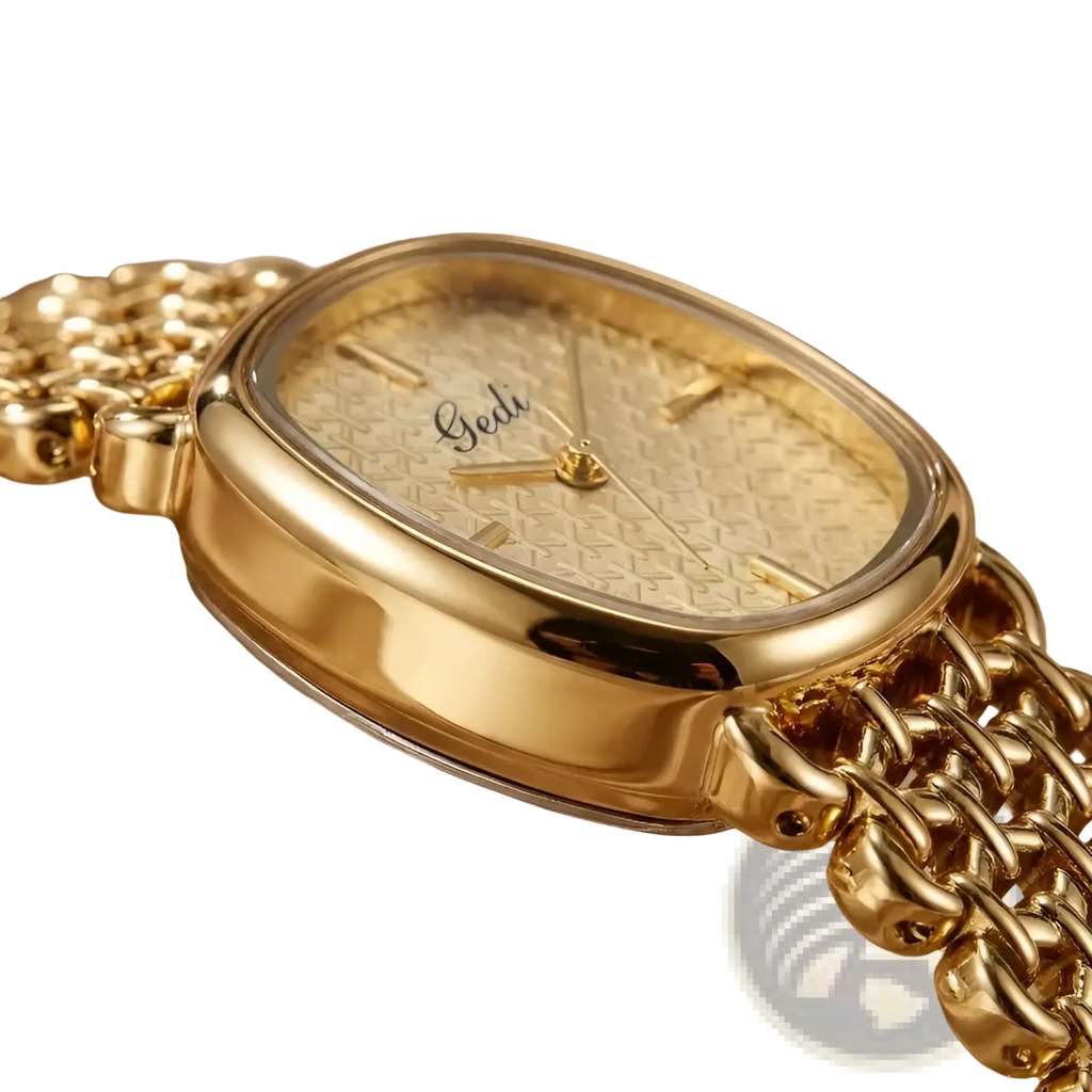 Gold-toned gedi watch with oval face, textured light gold dial, and matching mesh bracelet elegant quartz timepiece