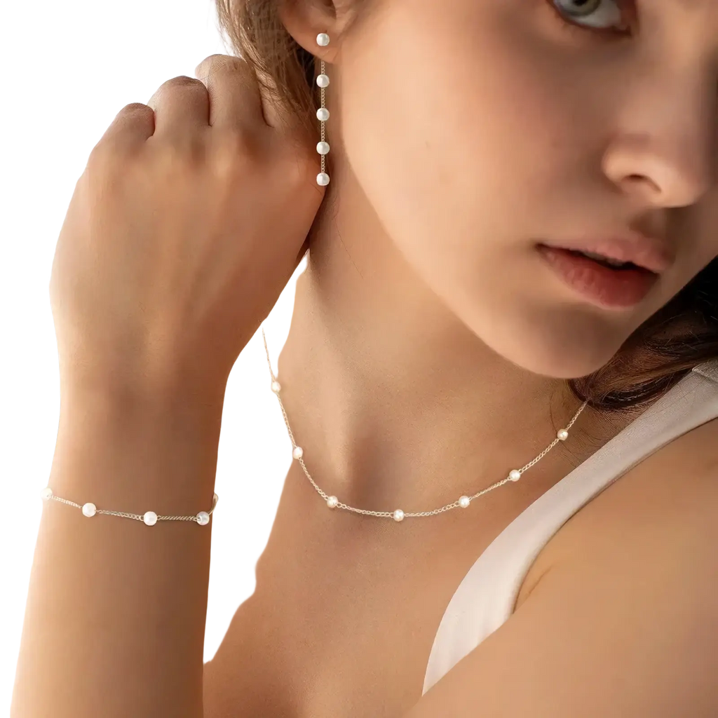 Delicate silver chain necklace with evenly spaced round white pearls from gold pearl jewelry set women