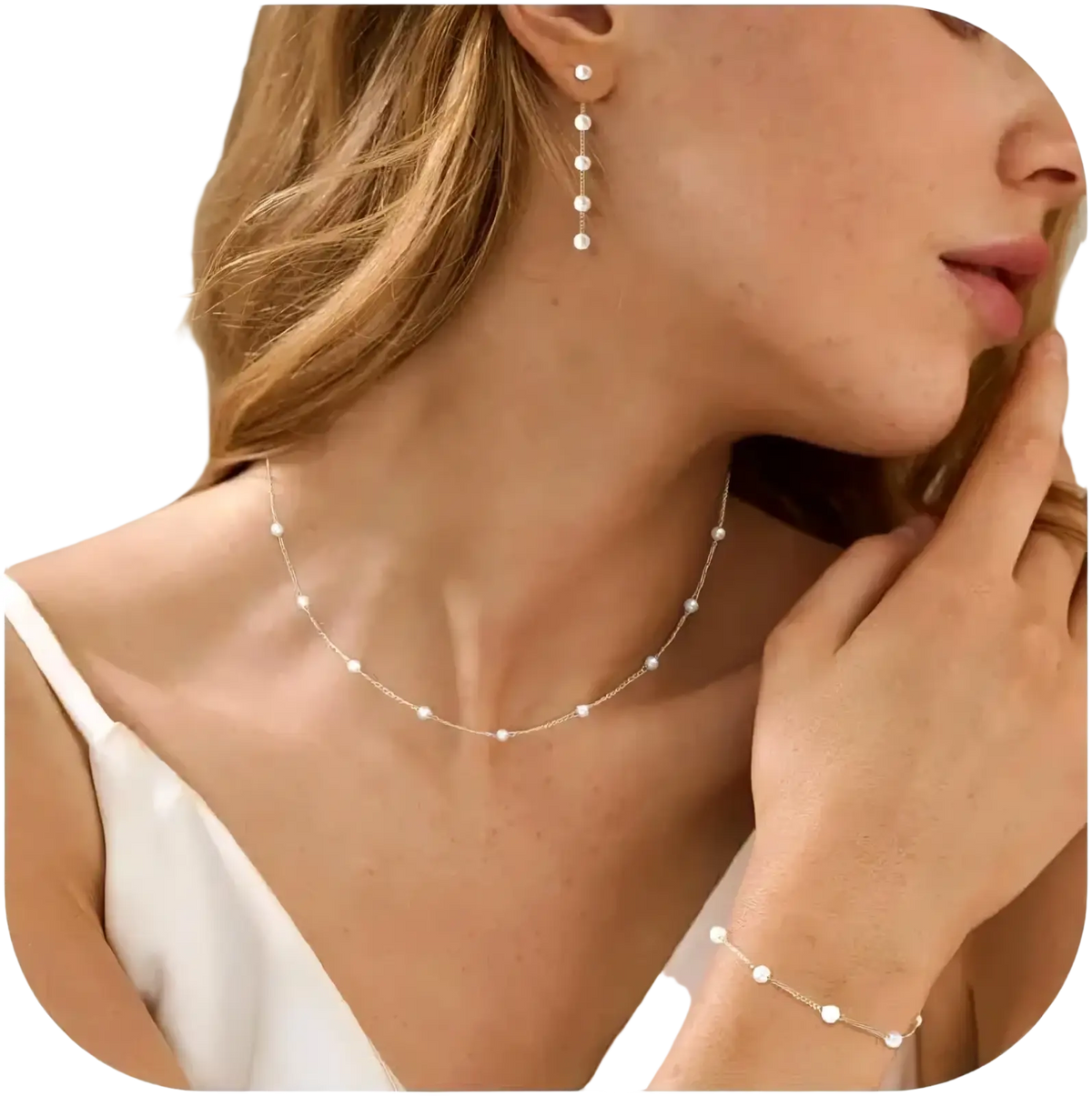 Delicate gold pearl jewelry set for women featuring a slender gold-toned chain with small white pearls evenly spaced