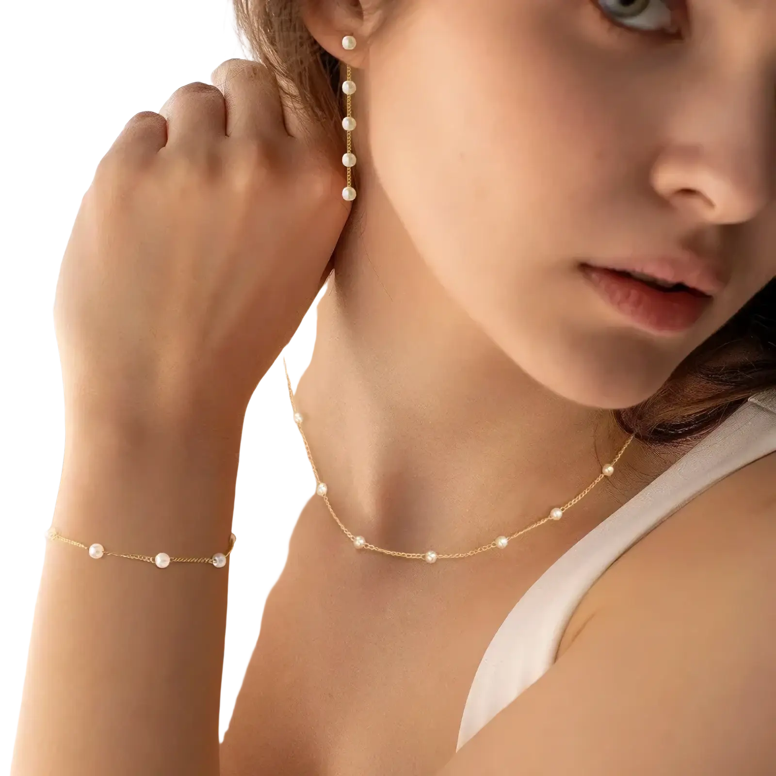 Delicate gold pearl necklace for women featuring lustrous white pearls evenly spaced on a fine chain
