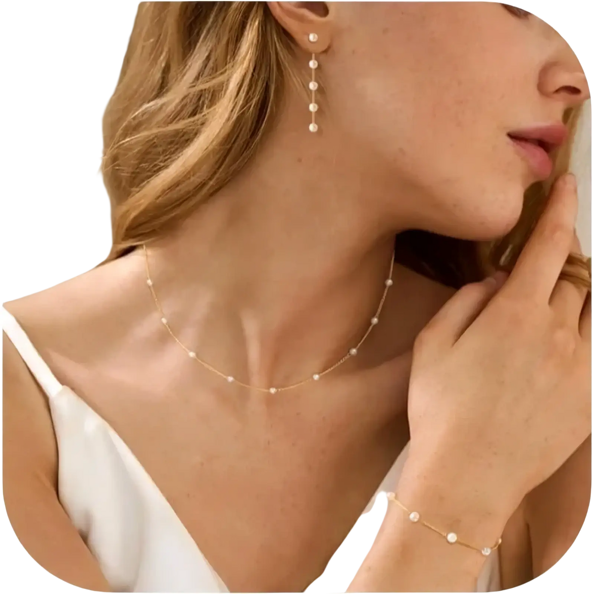 Delicate gold pearl necklace for women featuring a fine chain with evenly spaced small white pearls