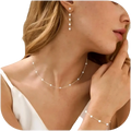 Delicate gold pearl jewelry set for women featuring a slender gold-toned chain with small white pearls evenly spaced
