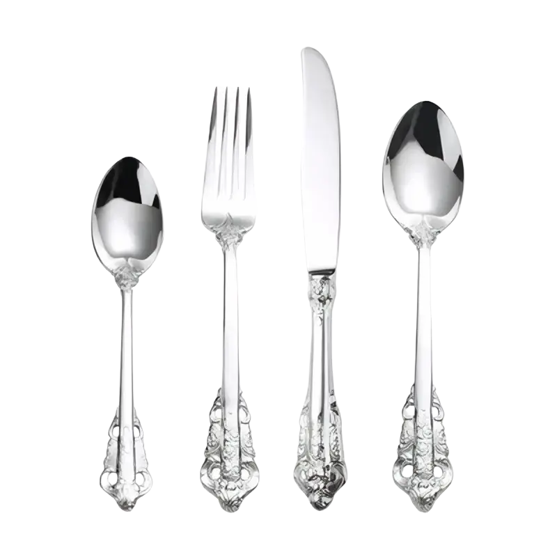 Silver-plated cutlery set with ornate vintage-inspired handles and polished reflective surfaces for western dining
