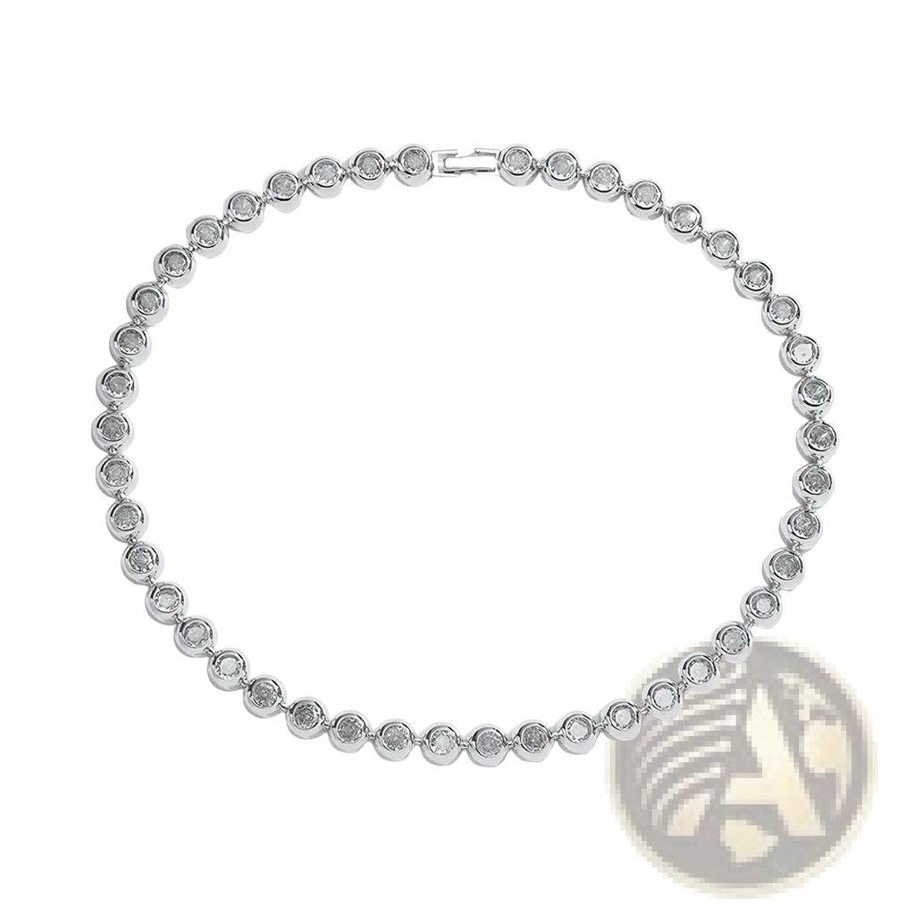 Silver tennis bracelet with continuous round sparkling stones set in a sleek polished band from gold plated cz jewelry set